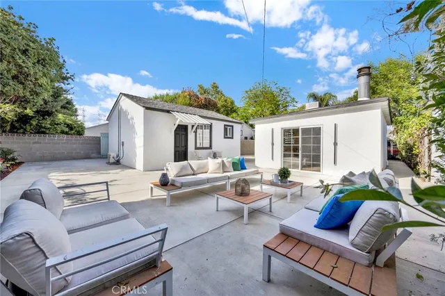 a building outdoor space with patio furniture