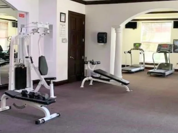 a view of a room with gym equipment