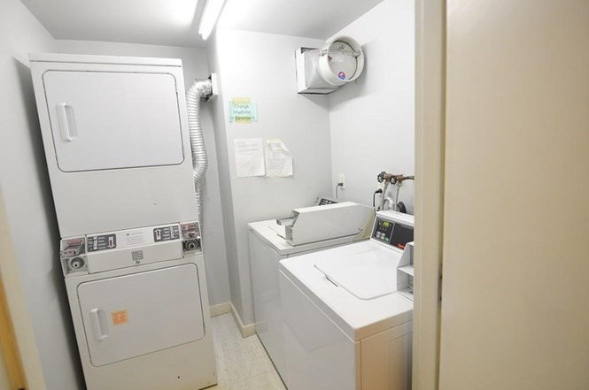 534 Commonwealth Avenue, Unit 3A Boston, MA 02215 - Photo 12 of 15 a utility room with dryer and washer