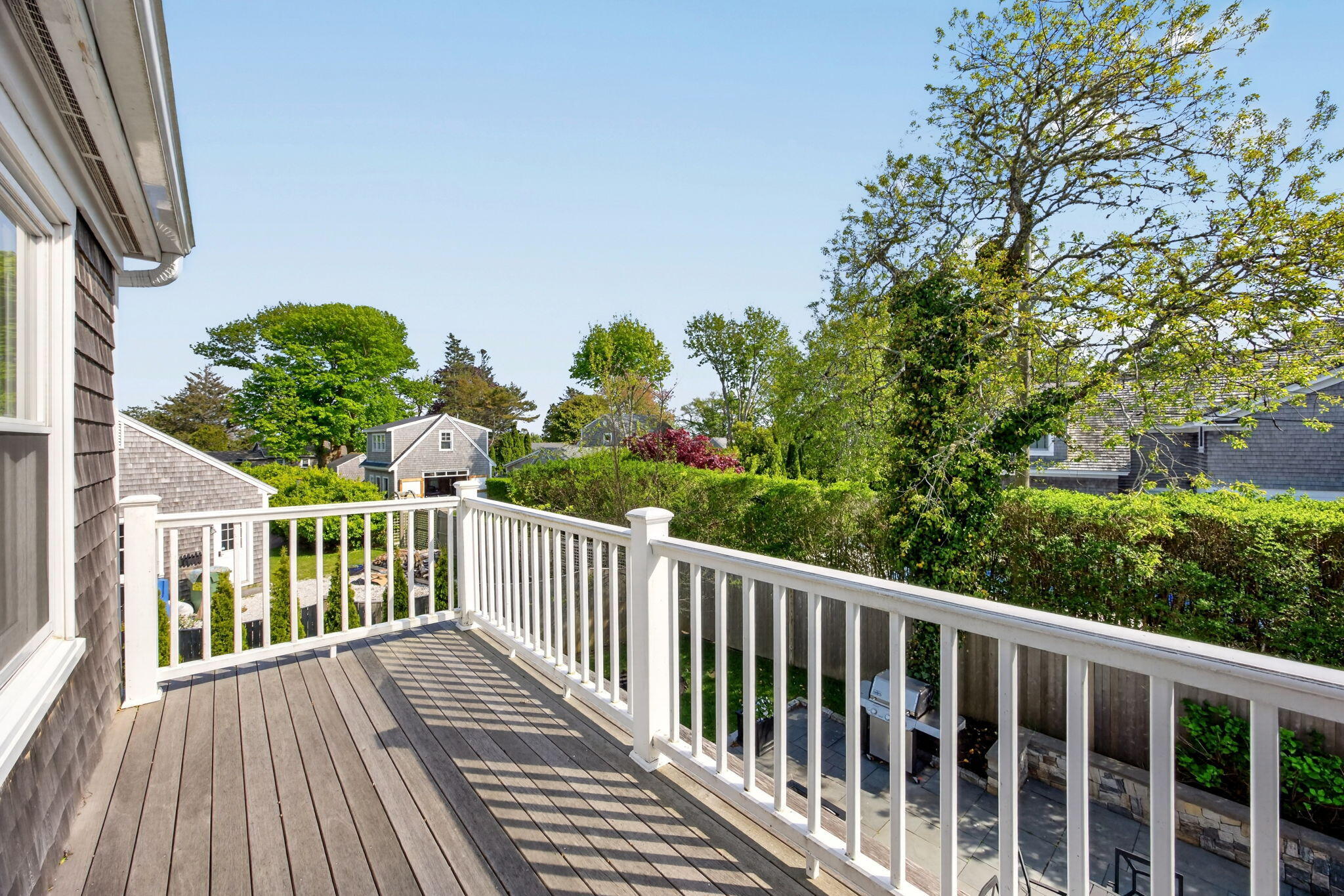 320 Old Harbor Road Chatham, MA 02633 - Photo 12 of 58 a view of a balcony with wooden floor