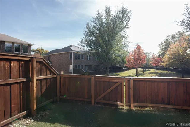 a view of a house with a roof deck