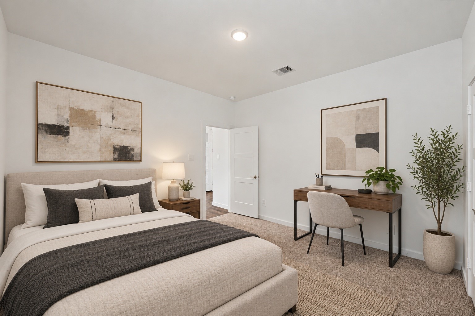 14162 Primrose Ridge Lane Conroe, TX 77384 - Photo 44 of 48 Experience the perfect balance of comfort and style in this beautifully staged bedroom, featuring a cozy bed, elegant decor, and a serene workspace.