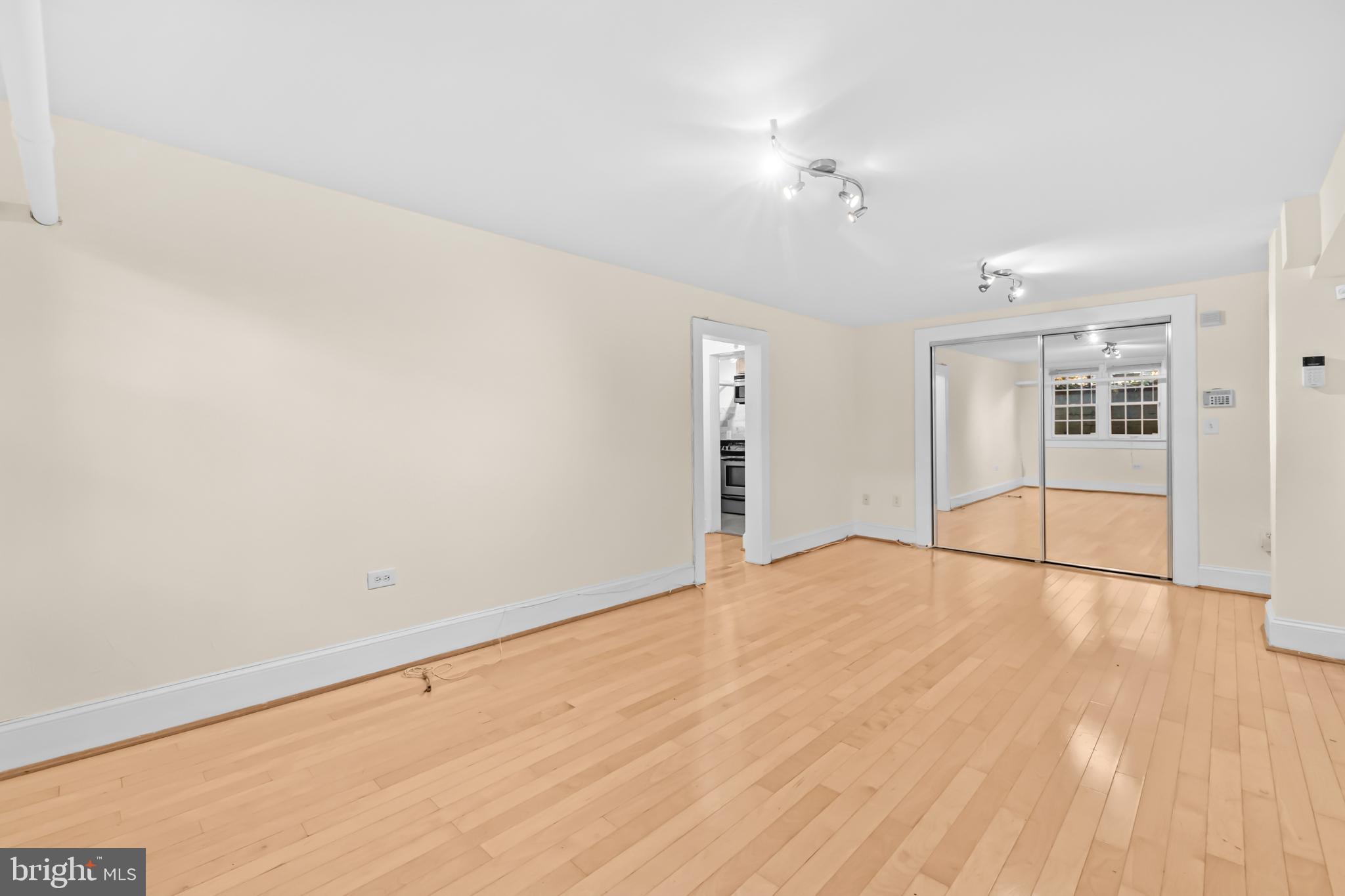 3001 Porter Street Northwest, Unit 100 Washington, DC 20008 - Photo 4 of 22 a view of an empty room