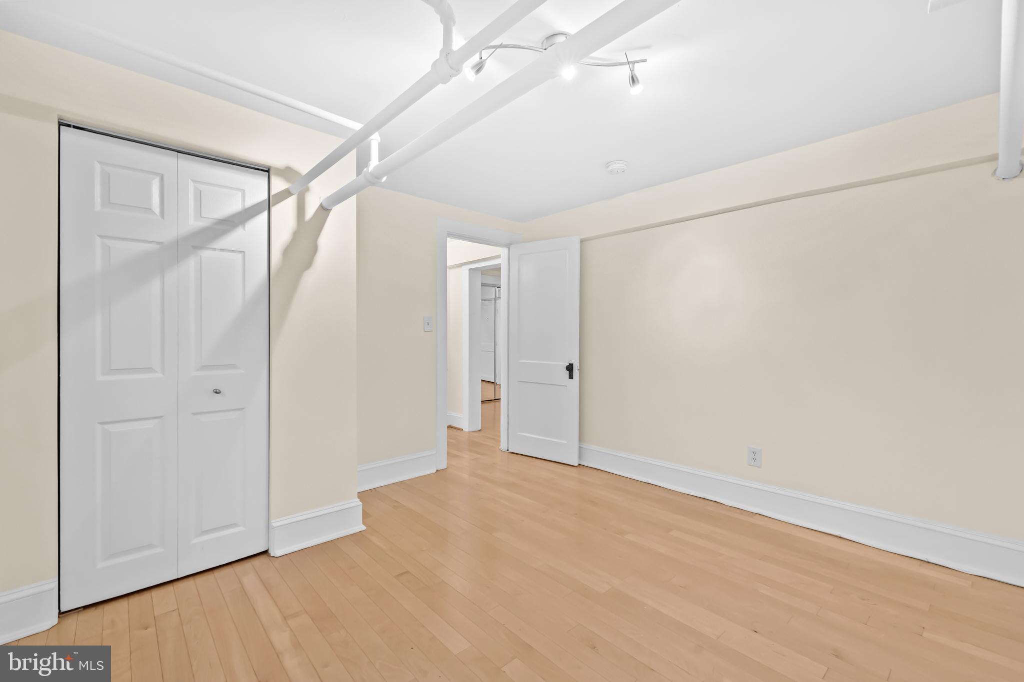 3001 Porter Street Northwest, Unit 100 Washington, DC 20008 - Photo 9 of 22 a view of an empty room
