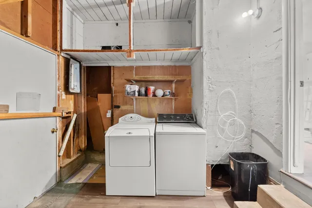a view of backyard with a table and chairs