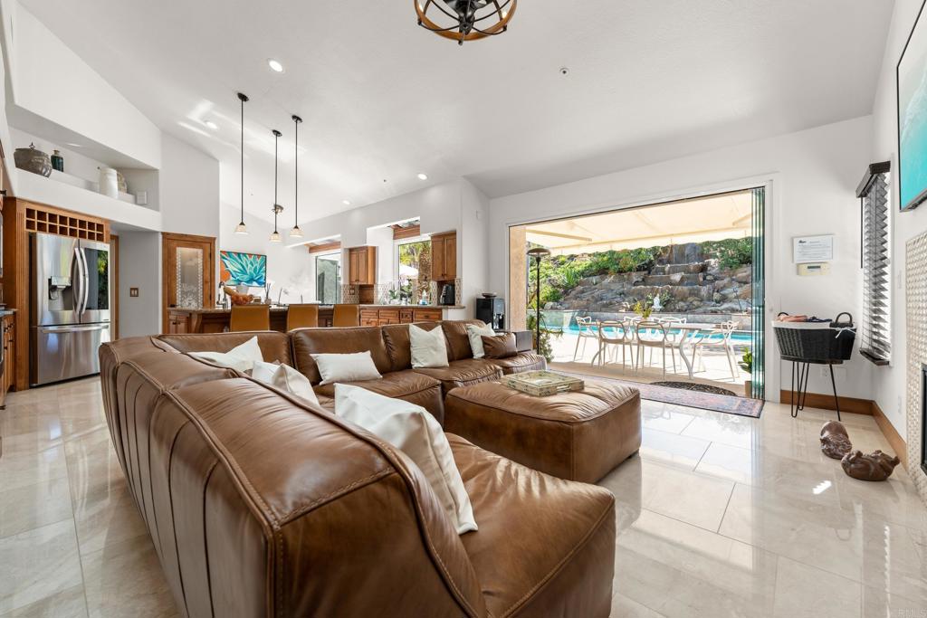 3427 Bumann Road Encinitas, CA 92024 - Photo 13 of 37 a large bedroom with furniture and large windows