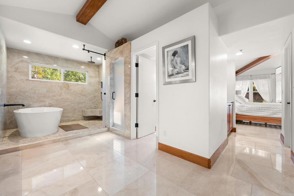3427 Bumann Road Encinitas, CA 92024 - Photo 21 of 37 a view of a hallway with bathroom and a shower