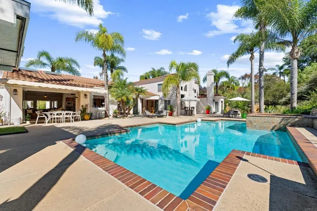 a view of a house with swimming pool