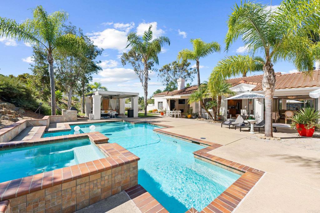 3427 Bumann Road Encinitas, CA 92024 - Photo 25 of 37 a view of a house with swimming pool and sitting area