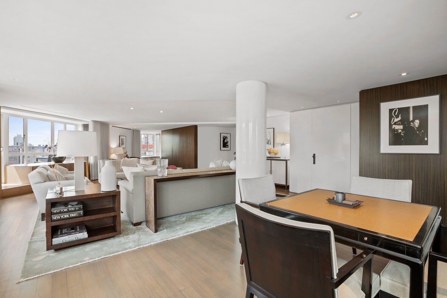 799 Park Avenue, Unit 19BC Manhattan, NY 10021 - Photo 2 of 12 a living room with stainless steel appliances kitchen island granite countertop furniture and a kitchen view