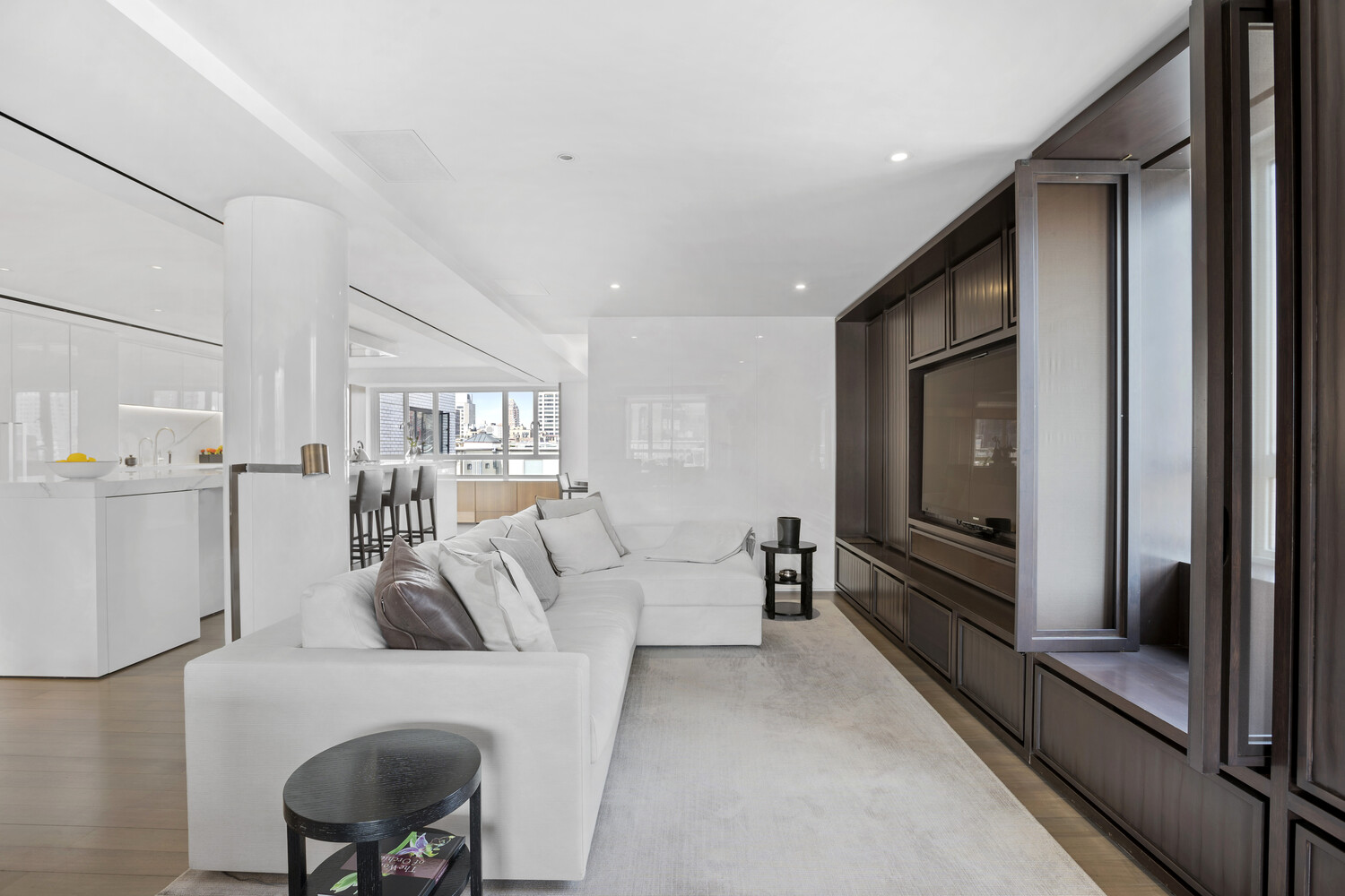 799 Park Avenue, Unit 19BC Manhattan, NY 10021 - Photo 5 of 12 a living room with furniture and a couch