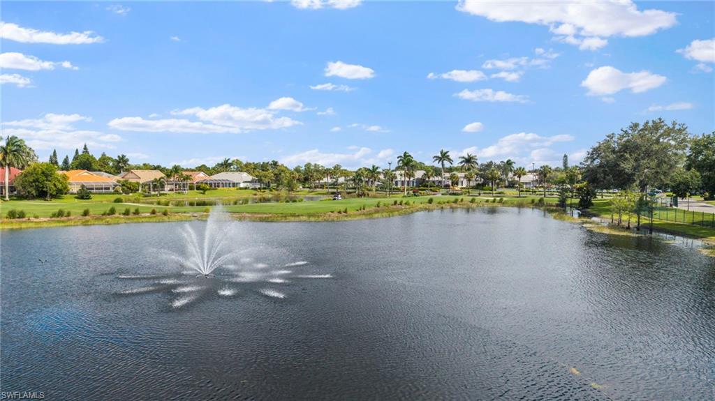 5801 Lago Villaggio Way Naples, FL 34104 - Photo 17 of 23 Water view featuring nearby suburban area