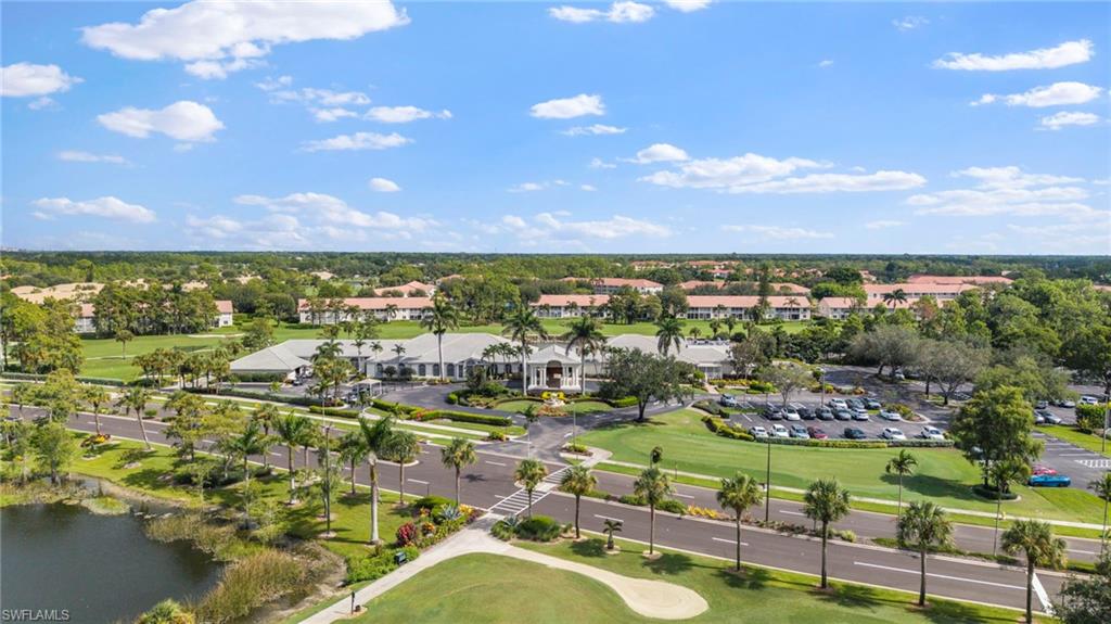 5801 Lago Villaggio Way Naples, FL 34104 - Photo 18 of 23 Drone / aerial view of a large body of water