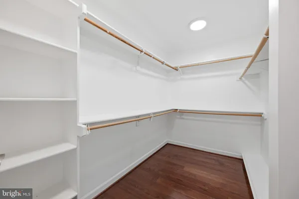 a view of an empty walk in closet
