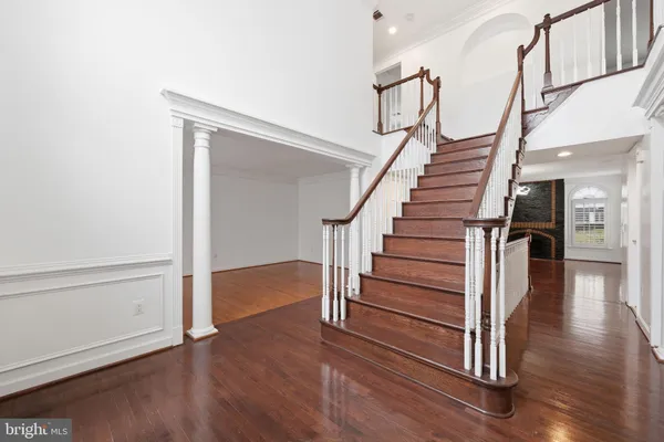 a view of entryway with wooden floor