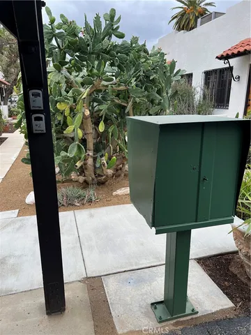 a vase with flowers sitting on a table