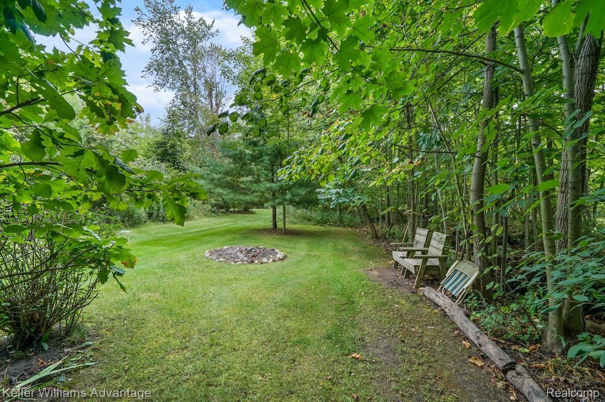 1501 East Marr Road Howell, MI 48855 - Photo 8 of 23 Wooded Firepit Area.jpg
