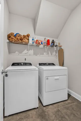 a utility room with dryer and washer