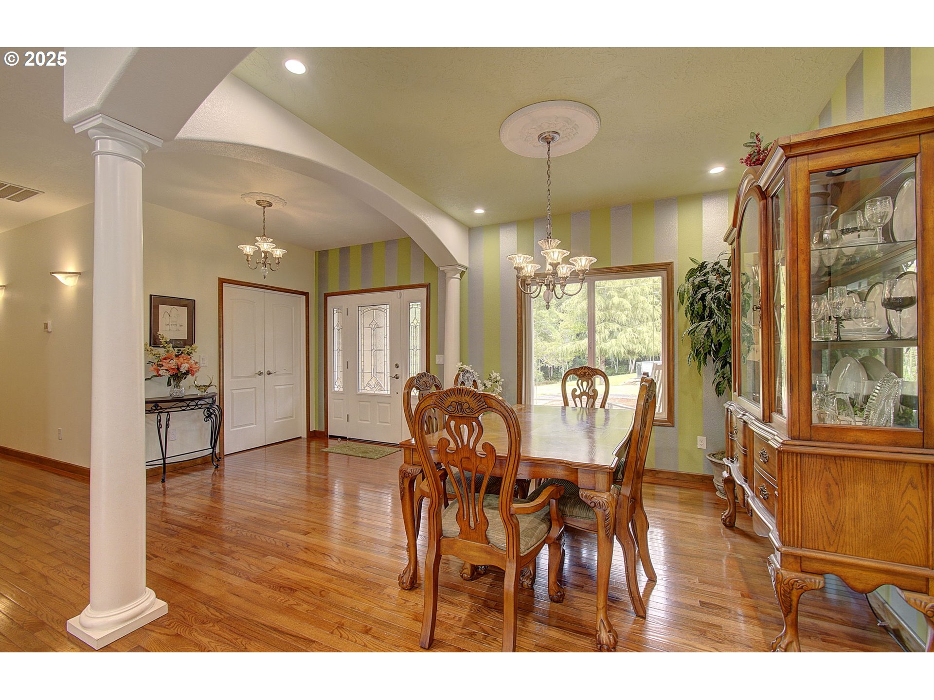 18229 Haven Acres Road Clatskanie, OR 97016 - Photo 11 of 45 a view of a dining room with furniture and wooden floor