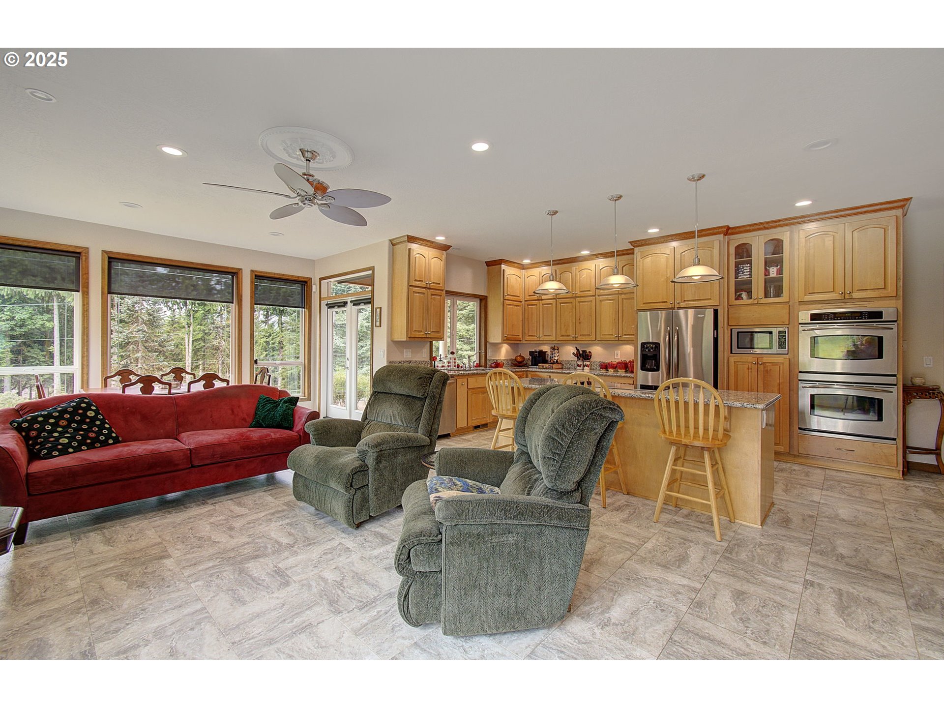 18229 Haven Acres Road Clatskanie, OR 97016 - Photo 16 of 45 a living room with furniture and kitchen view