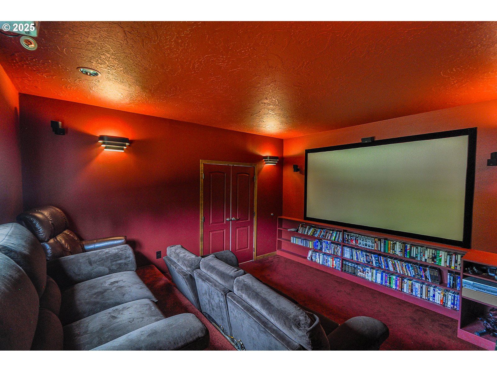 18229 Haven Acres Road Clatskanie, OR 97016 - Photo 24 of 45 a projector room with furniture and a projector screen