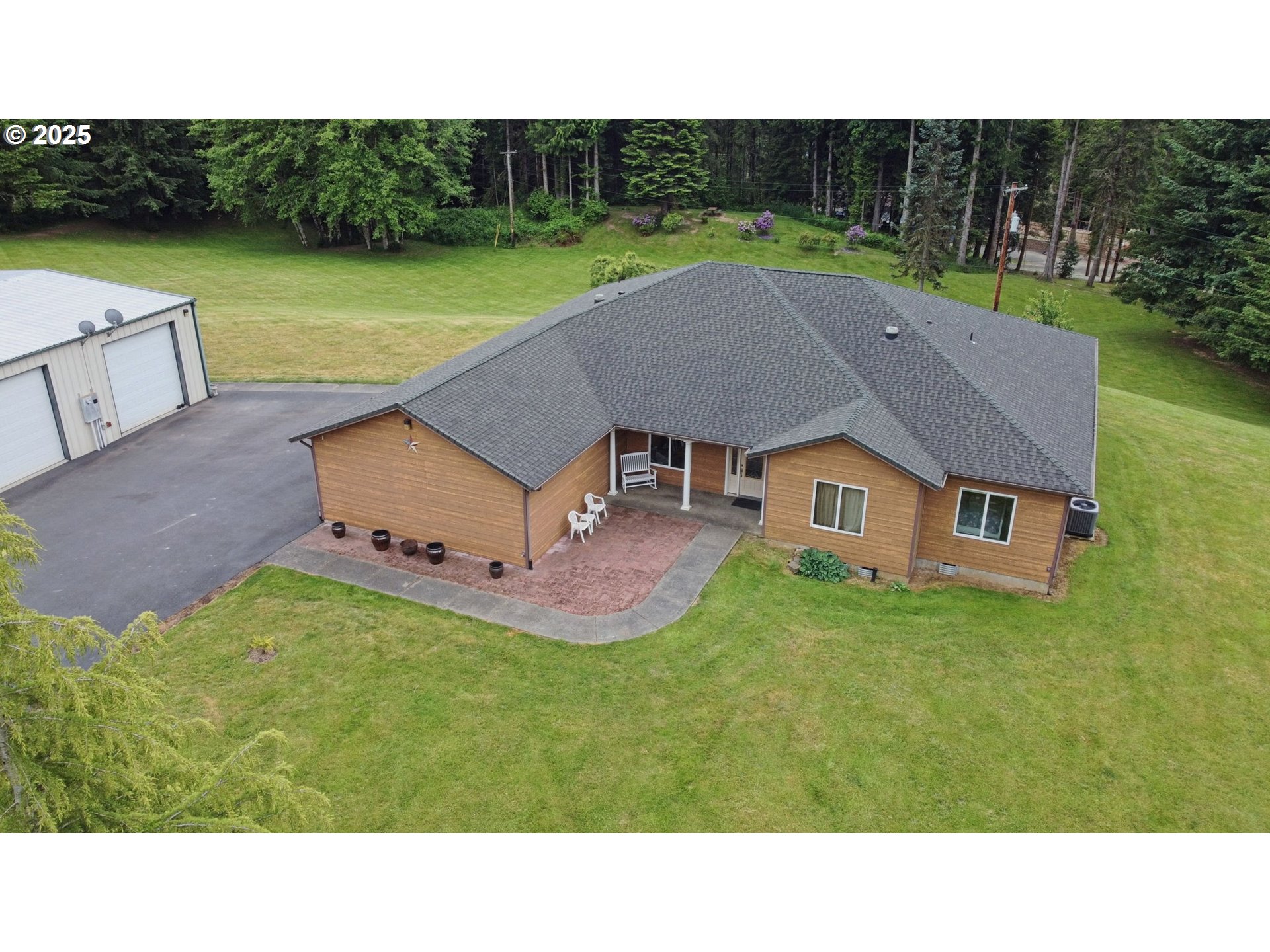 18229 Haven Acres Road Clatskanie, OR 97016 - Photo 3 of 45 a aerial view of a house having swimming pool having outdoor kitchen