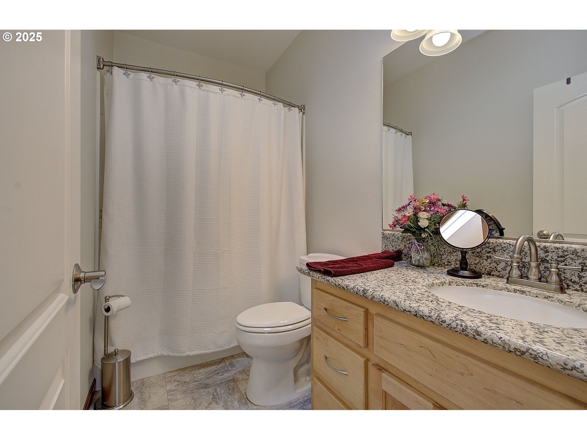 18229 Haven Acres Road Clatskanie, OR 97016 - Photo 32 of 45 a bathroom with a granite countertop sink mirror and toilet