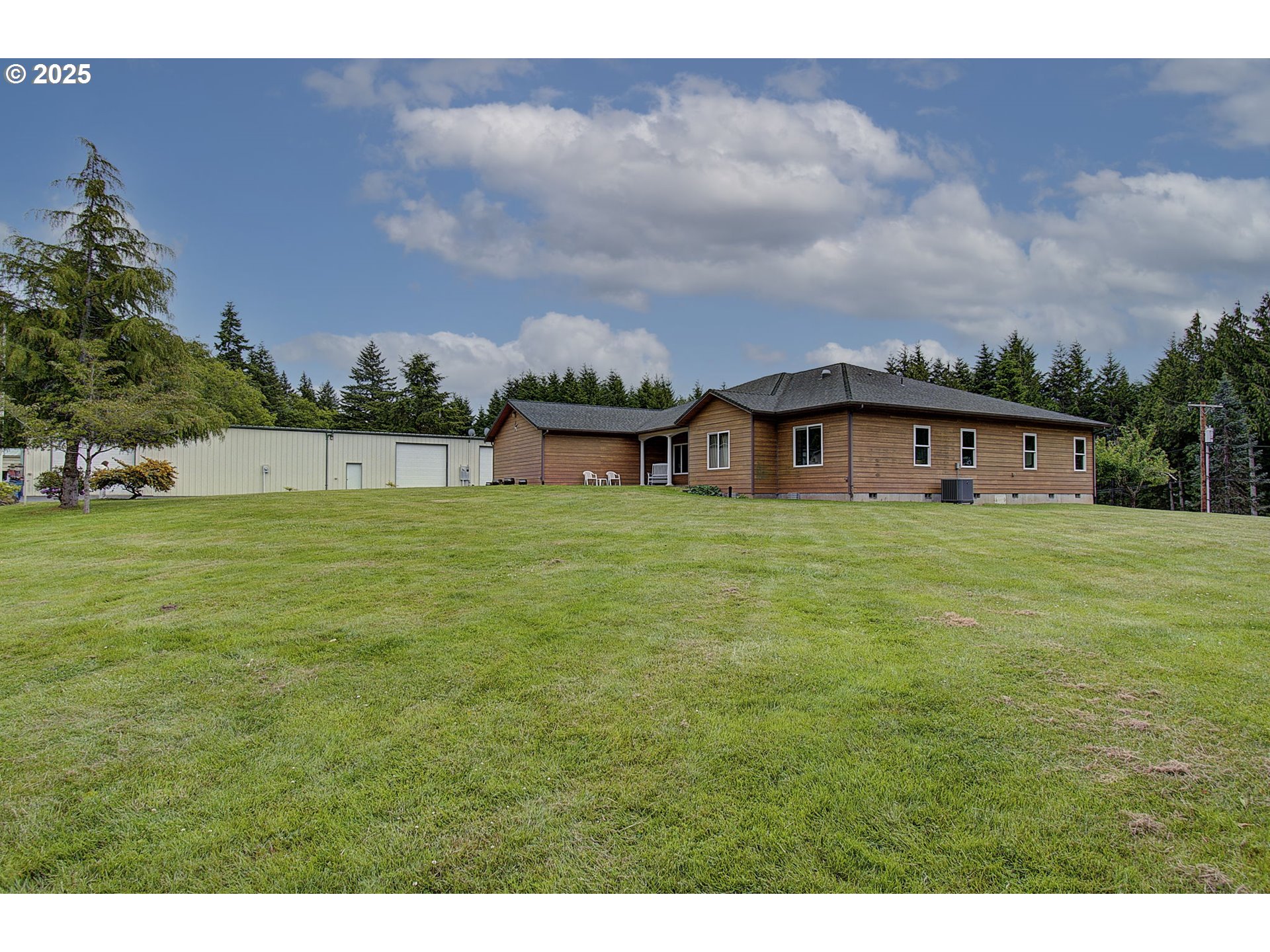 18229 Haven Acres Road Clatskanie, OR 97016 - Photo 44 of 45 a house view with swimming pool in front of it