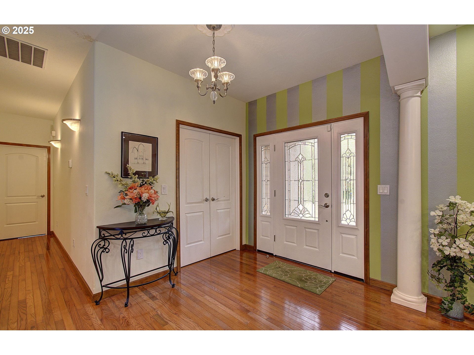 18229 Haven Acres Road Clatskanie, OR 97016 - Photo 9 of 45 a living room with furniture and a chandelier