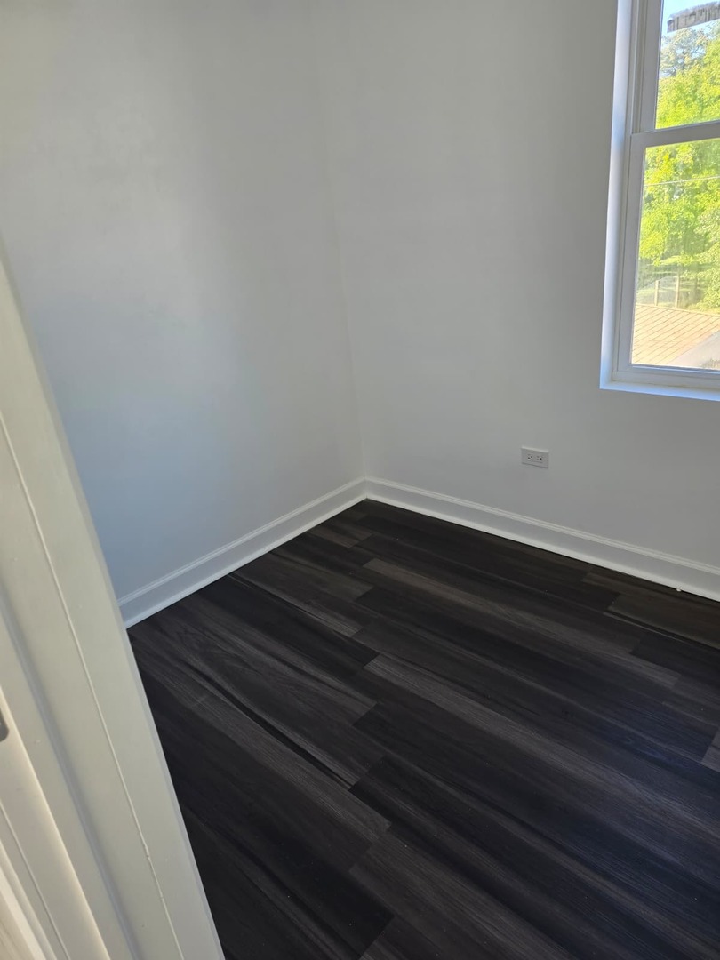 5740 South Elizabeth Street Chicago, IL 60636 - Photo 15 of 45 a room with a window