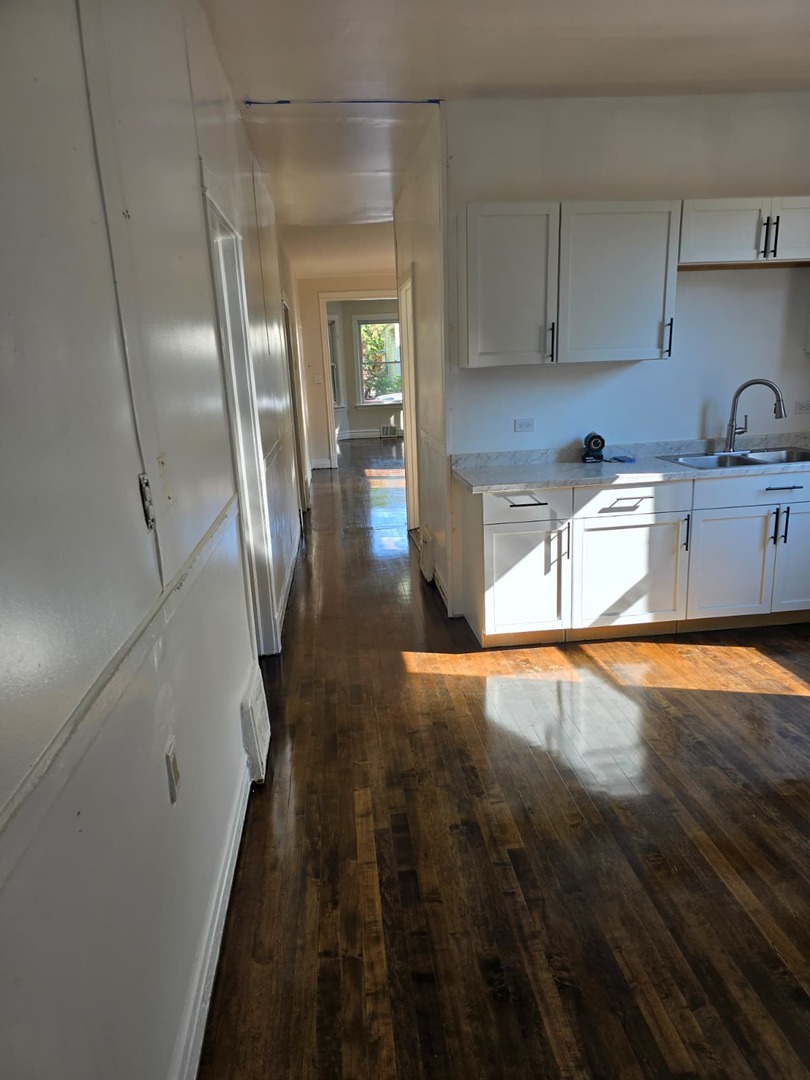 5740 South Elizabeth Street Chicago, IL 60636 - Photo 28 of 45 a view of a kitchen with a sink and dishwasher