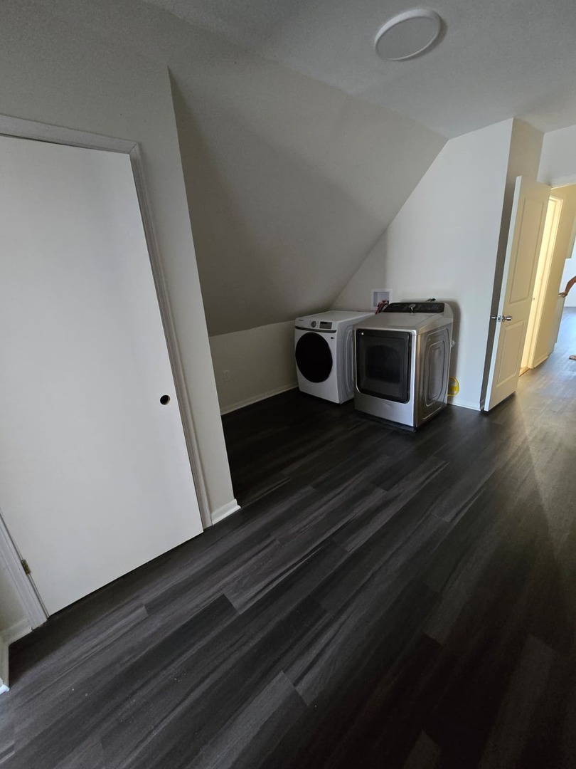 5740 South Elizabeth Street Chicago, IL 60636 - Photo 31 of 45 a utility room with wooden floor