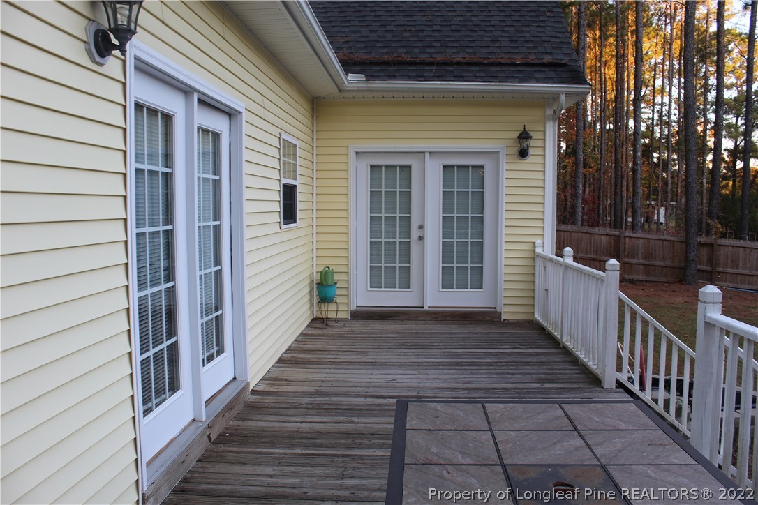 678 Tilghman Road Coats, NC 27521 - Photo 15 of 47 a view of a house with wooden floor
