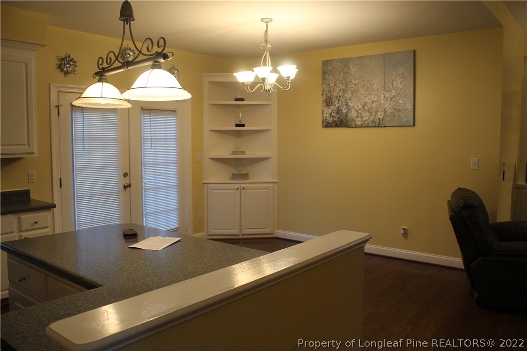 678 Tilghman Road Coats, NC 27521 - Photo 28 of 47 a view of a dining room with a table and chairs