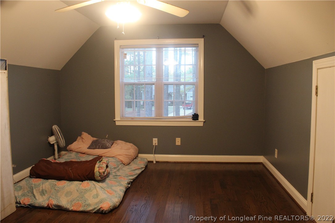 678 Tilghman Road Coats, NC 27521 - Photo 31 of 47 a bed room with a bed and a window