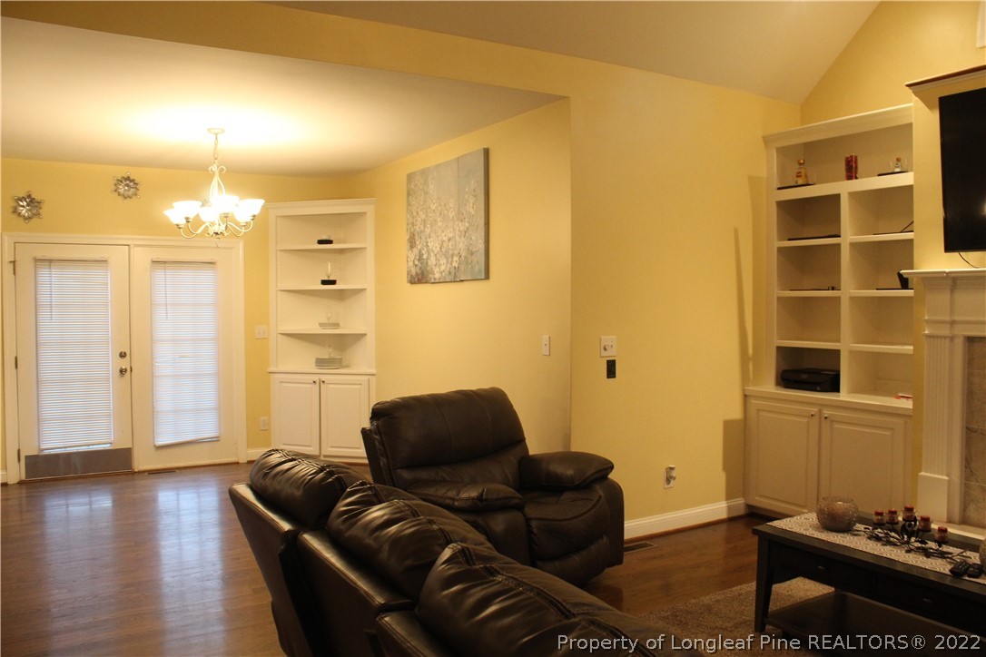 678 Tilghman Road Coats, NC 27521 - Photo 42 of 47 a living room with furniture and a window