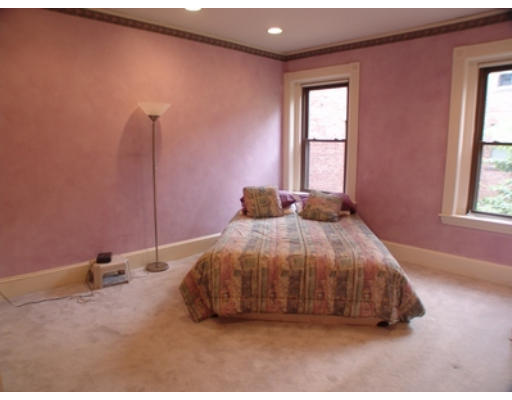 26 Beaufort Road, Unit 2 Boston, MA 02130 - Photo 6 of 8 a bedroom with a bed and a window
