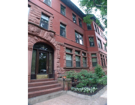 26 Beaufort Road, Unit 2 Boston, MA 02130 - Photo 7 of 8 a view of a building with a garden