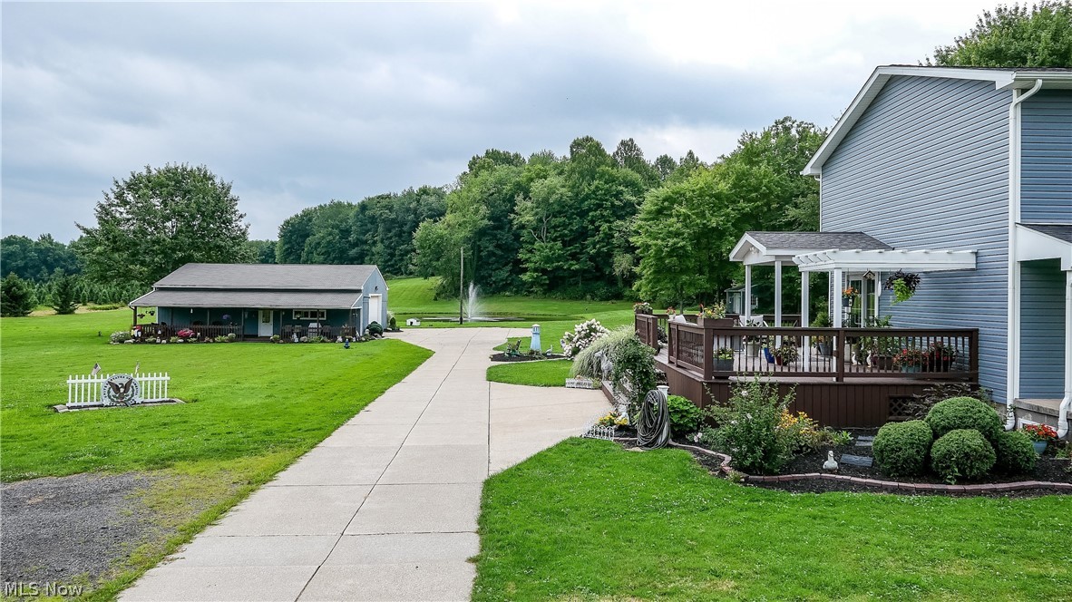 3770 Winchell Road Mantua, OH 44255 - Photo 22 of 34 Newer concrete driveway with lots of parking leads to the large pole barn.