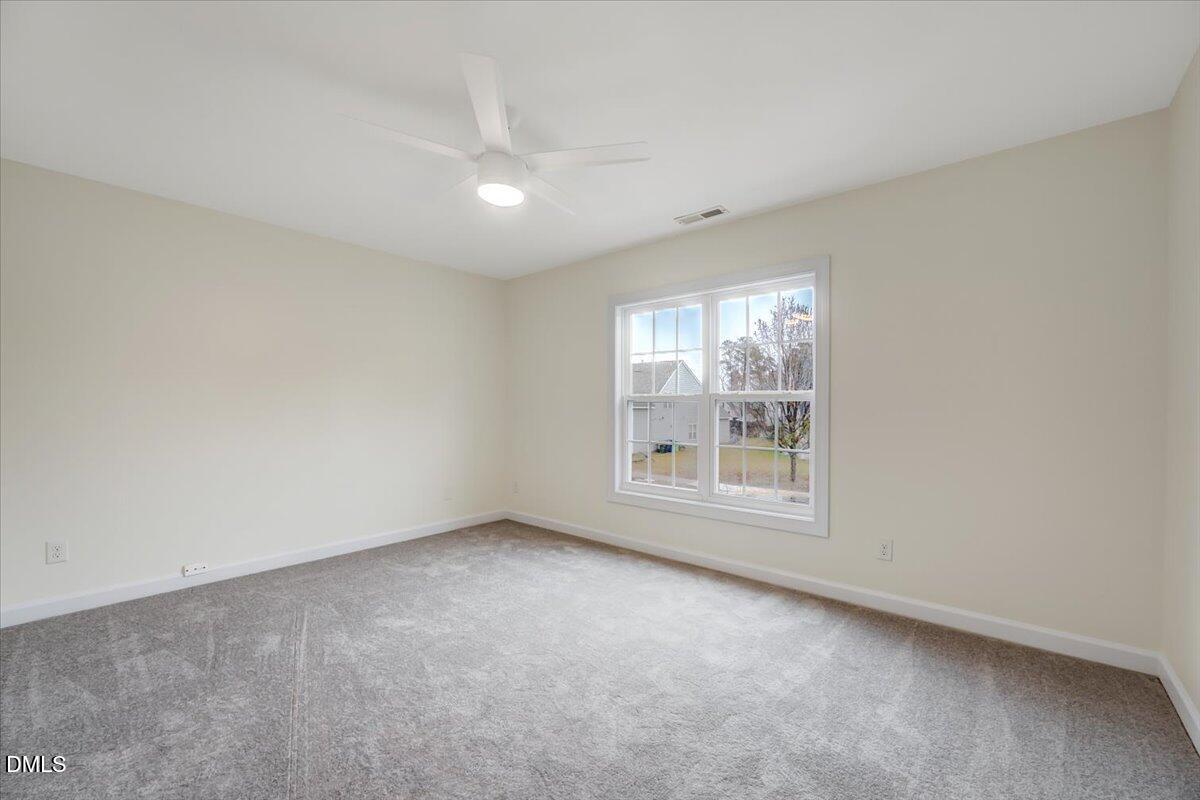 3218 Trassacks Drive Raleigh, NC 27610 - Photo 26 of 37 an empty room with a window