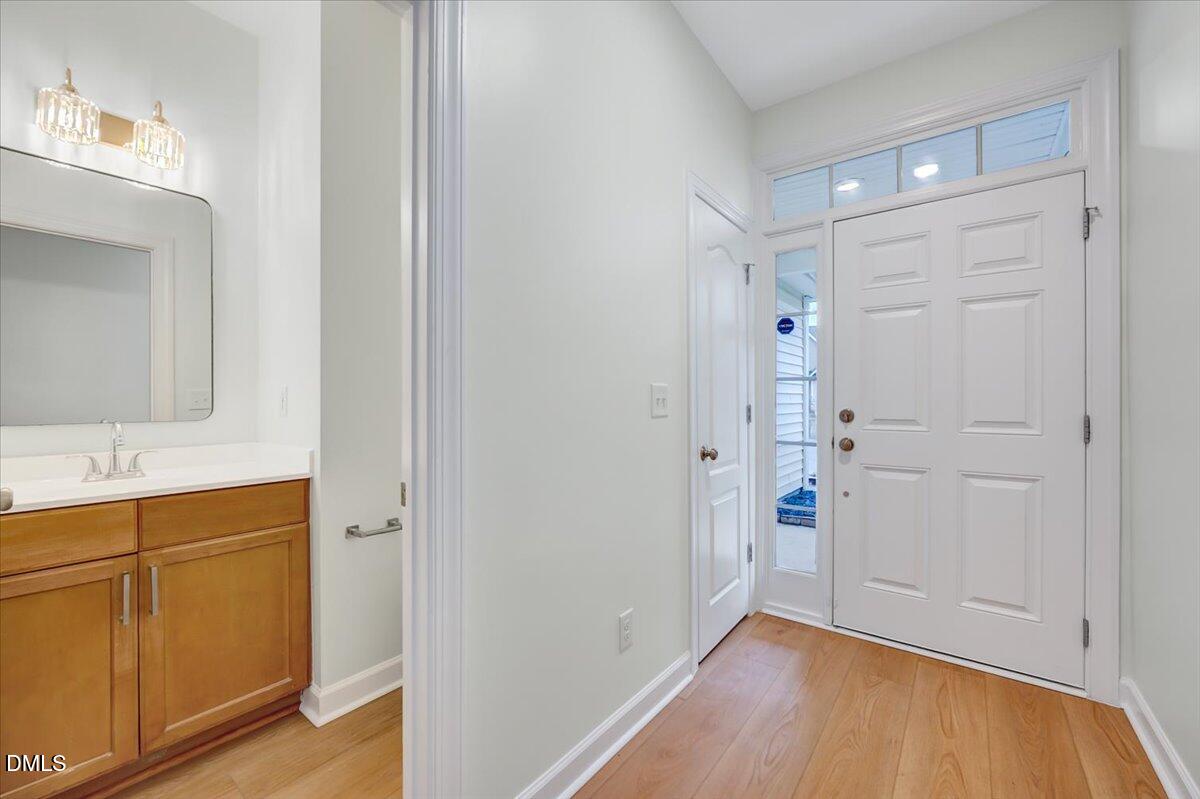 3218 Trassacks Drive Raleigh, NC 27610 - Photo 4 of 37 a view of bathroom with a sink and mirror