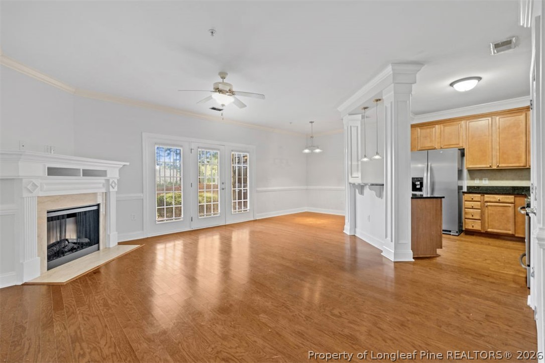 62 Gallery Drive, Unit 102 Spring Lake, NC 28390 - Photo 5 of 23 a view of an empty room with a fireplace and a window