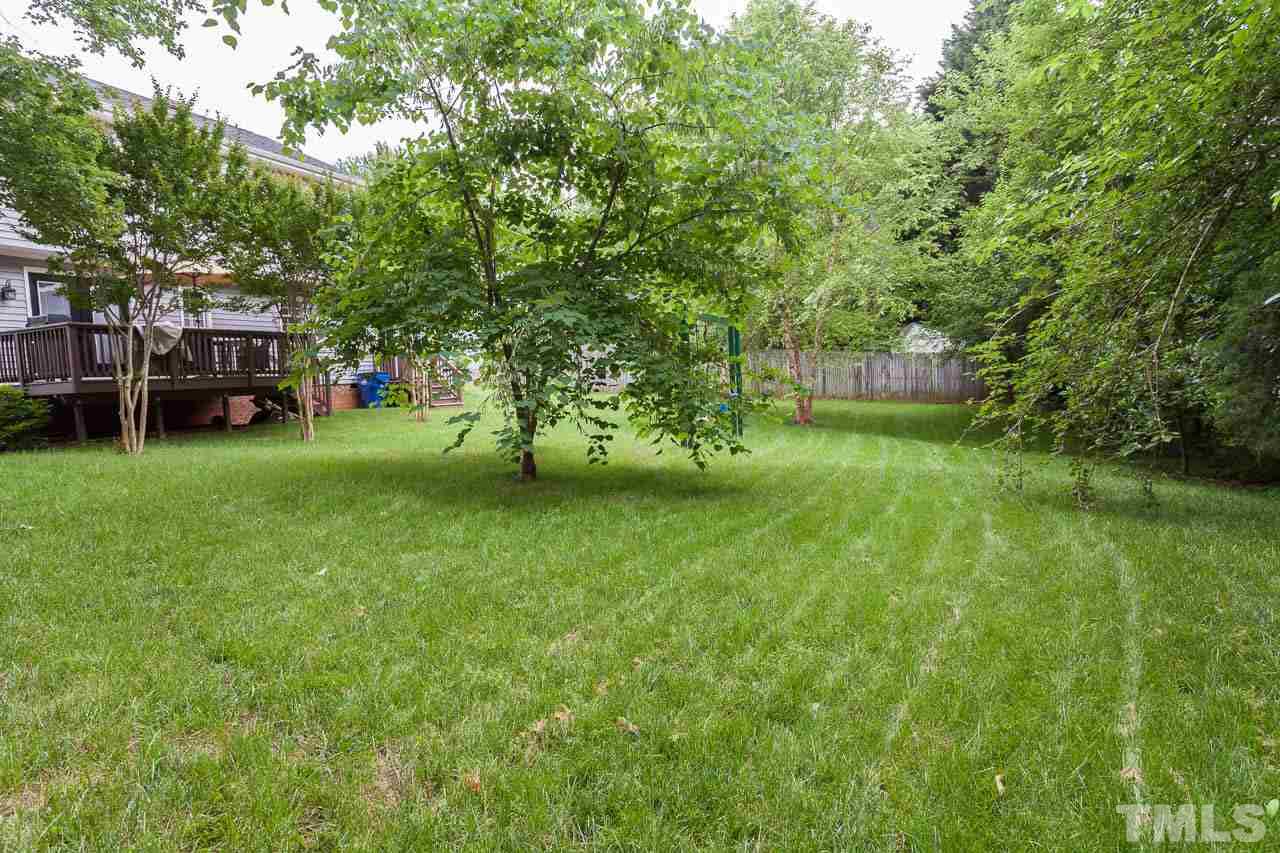 7317 Ridge Grove Court Raleigh, NC 27615 - Photo 11 of 25 a view of a park with large trees