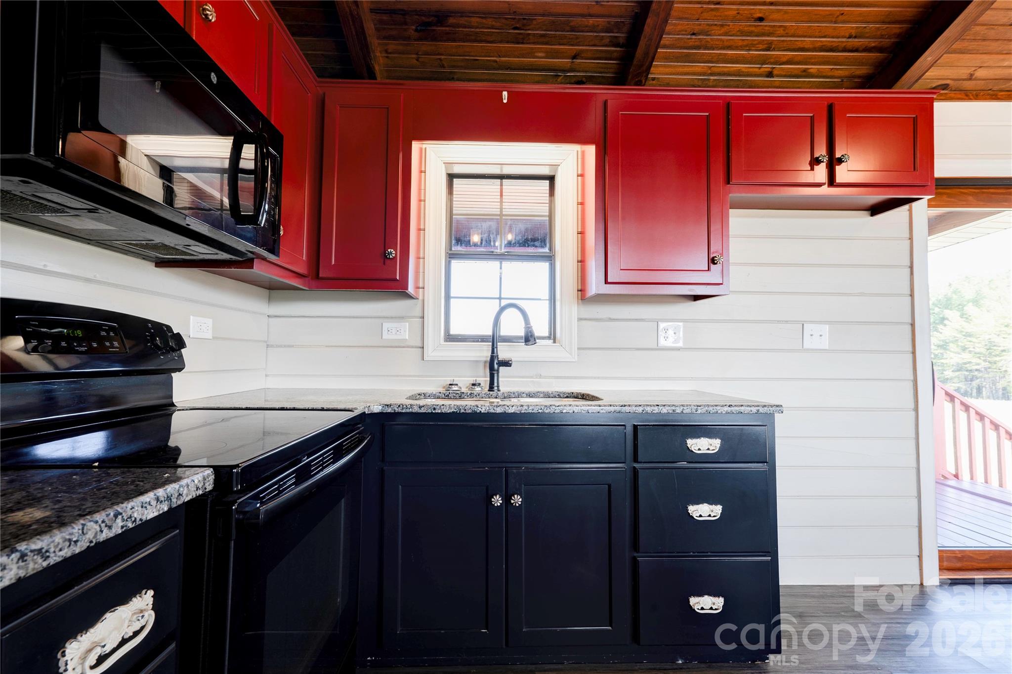 101 Hull Road Casar, NC 28020 - Photo 12 of 25 a kitchen with stainless steel appliances granite countertop a stove and a sink