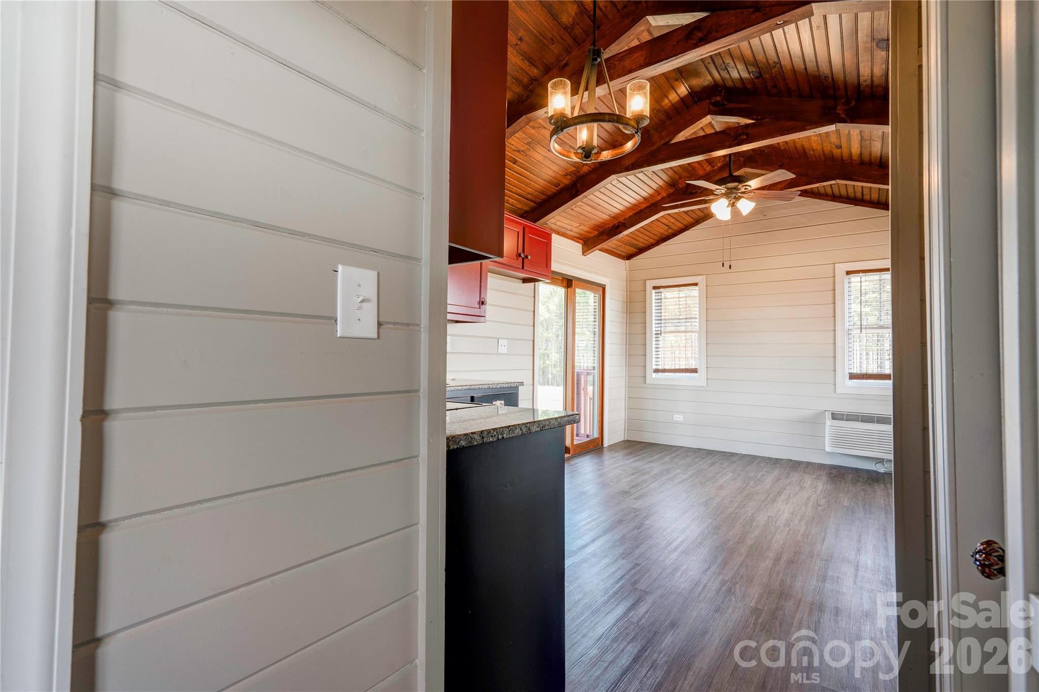 101 Hull Road Casar, NC 28020 - Photo 19 of 25 a view of empty room with wooden floor and fan