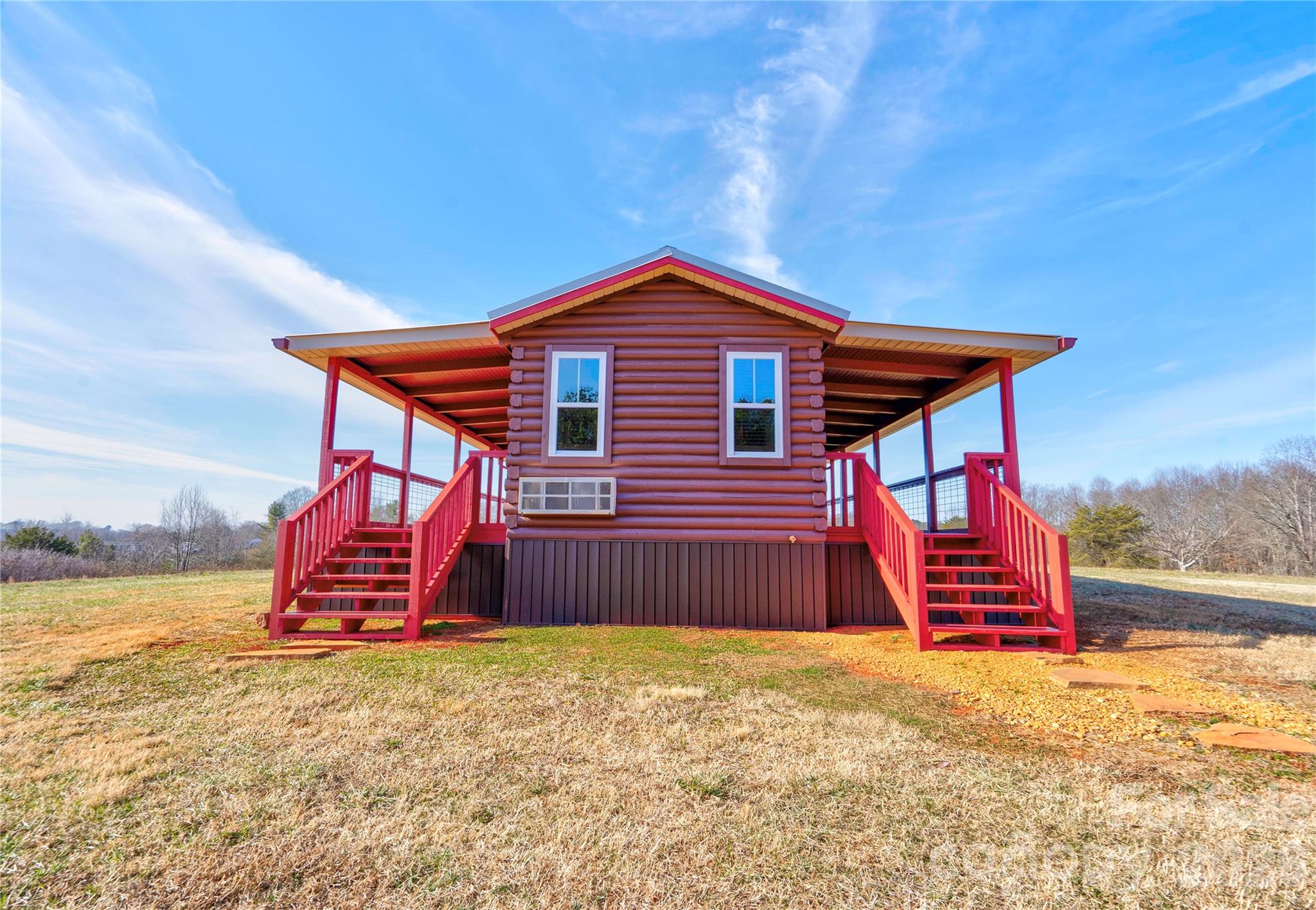 101 Hull Road Casar, NC 28020 - Photo 2 of 25 a front view of a house with a yard