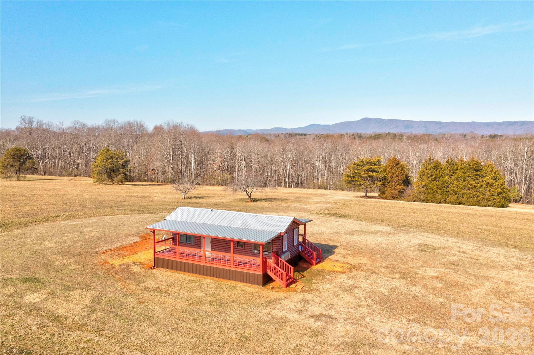 101 Hull Road Casar, NC 28020 - Photo 24 of 25 a view of swimming pool with a yard and large trees
