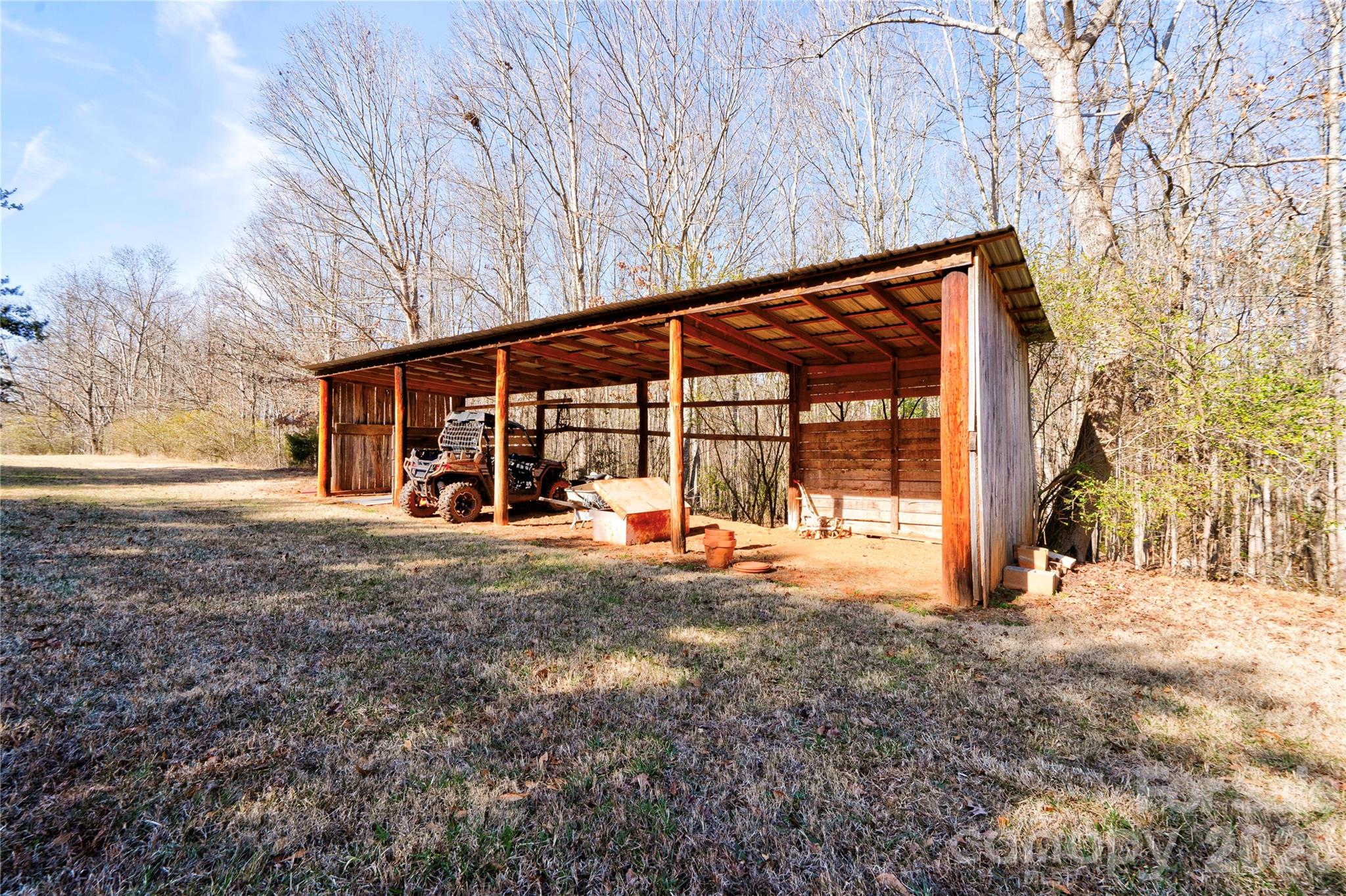 101 Hull Road Casar, NC 28020 - Photo 7 of 25 a view of a house with backyard porch and garden