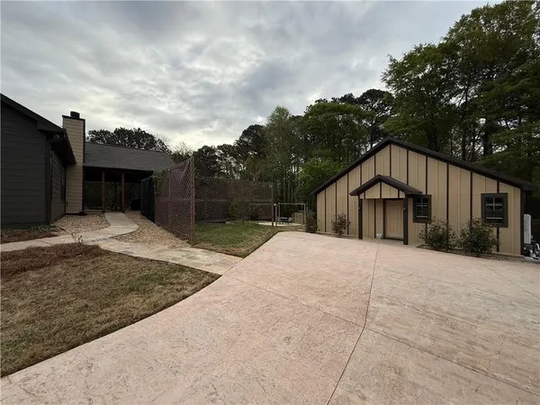 a house with trees in front of it