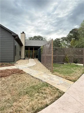 a house with yard in front of it